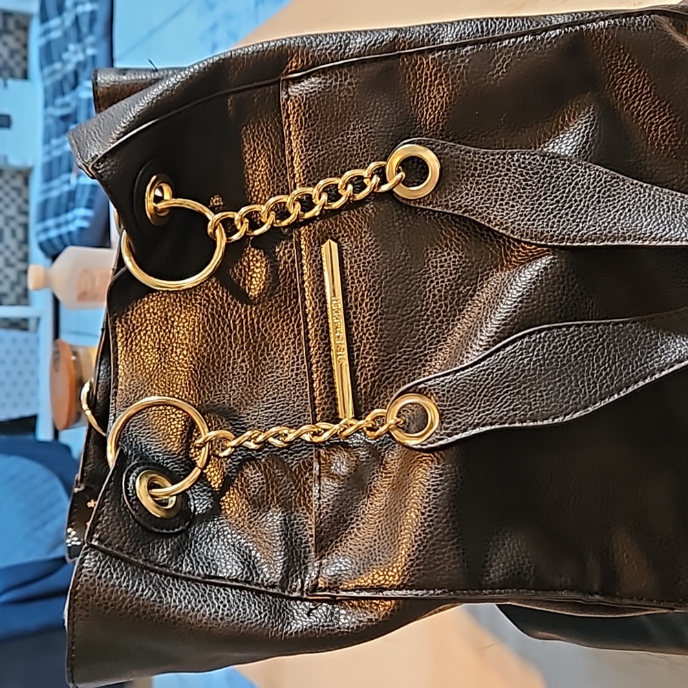 Steve madden large tote in black with blue flowers inside